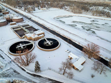 Aerial view of industrial area of Fort Collins, Colorado with a waste water treatment plant and a...