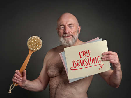 dry brushing concept for self care, skin detoxification, promoting lymph flow and stimulating...