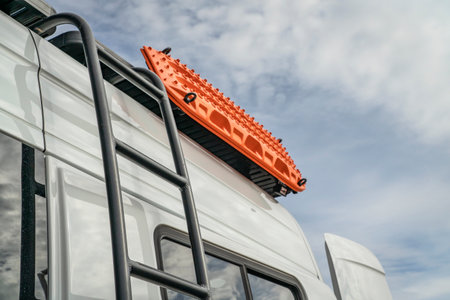 detail of 4x4 camper van with a ladder, roof racks and recovery laddersの写真素材