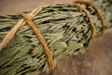 siskiyou cedar incense bundle on a textured bark paper, aromatherapy concept, macro shotの写真素材