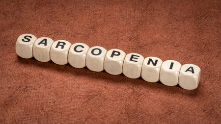 sarcopenia - muscle loss due to aging, word in letter cubes, health and senior fitness conceptの写真素材