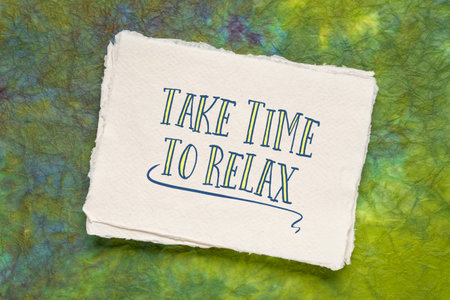 take time to relax, inspirational reminder - handwriting on a watercolor paper, self care conceptの写真素材