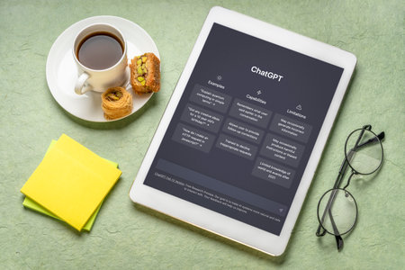 Fort Collins, CO, USA - February 22, 2023: Webpage of ChatGPT, a prototype AI chatbot, is seen on the website of OpenAI, on a digital tablet. Examples, capabilities, and limitations are shown before a new chat.のeditorial素材