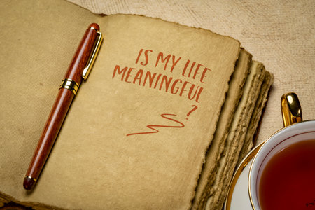 Is my life meaningful? Inspirational question in retro journal or diary, life design and personal development concept.の写真素材