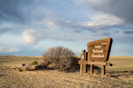 Stoneham, CO, USA - April 20, 2023: Leaving Pawnee National Grassland - roadsign in eastern Colorado, spring scenery.のeditorial素材