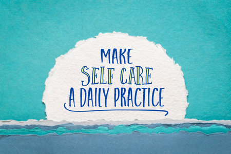 make self care a daily practice - inspirational advice on an art paper, healthy lifestyle and personal development conceptの写真素材