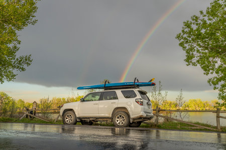 Fort Collins, CO, USA - May 15, 2023: Toyota 4Runner SUV with a touring stand up paddleboard...