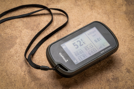 Fort Collins, CO, USA - May 29. 2023: Garmin handheld Oregon 700 GPS device designed for hiking and other outdoor activities.のeditorial素材