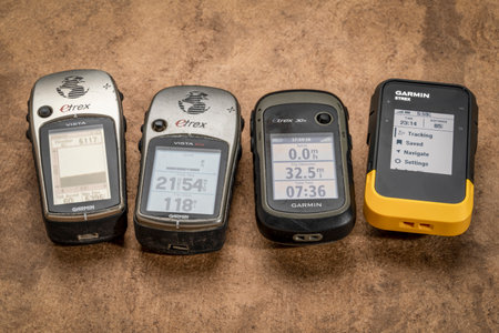 Fort Collins, CO, USA - May 29. 2023: Various models of Garmin handheld Etrex GPS device used in...