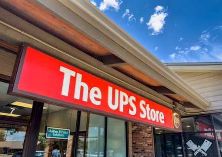 Fort Collins, CO, USA - July 10,2023: Entrance sign for The UPS Store, a subsidiary of United Parcel Service which provides, shipping, shredding, printing, fax, passport photos, personal and business mailboxes.のeditorial素材