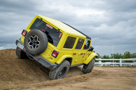 Loveland, CO, USA - August 25, 2023: Jeep Wrangler, Rubicon model, on a dusty training drive...