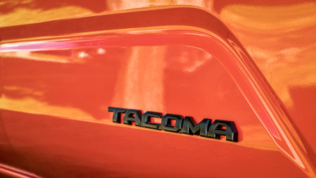 Loveland, CO, USA - August 25, 2023: Toyota Tacoma truck detail - a  logo on truck side.