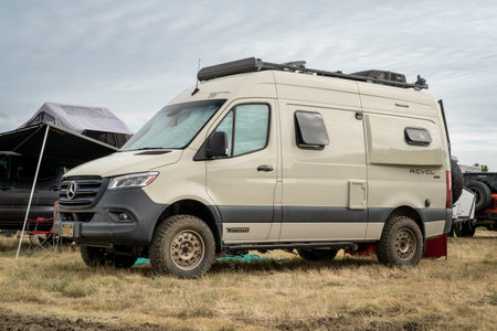 Loveland, CO, USA - August 26, 2023: Winnebago Revel camper van in a busy campground.のeditorial素材