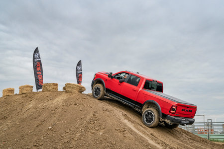 Loveland, CO, USA - August 26, 2023: RAM Rebel truck on a muddy training off-road trail course.のeditorial素材