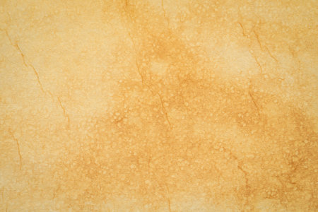 tan toned heavyweight vintage handmade paper - background and textureの写真素材