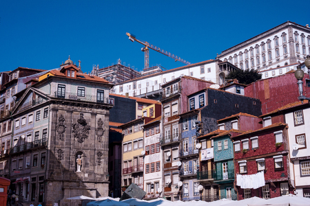 Many different house fronts in different colors in the center of Portoの写真素材