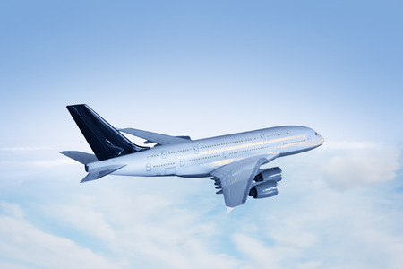 Airliner flies above the cloudsの写真素材