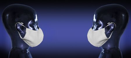 Two artificial and identical heads wear a face mask