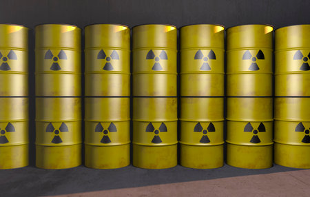 Many radioactive barrels are stored in a concrete roomの写真素材