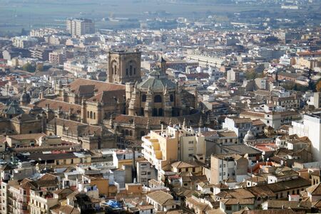 Cathedral in Granada located in Southern portion of Spain.  Picture taken from the Alhambra on the lower slopes of the Sierra Nevadaの写真素材