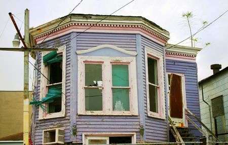 Purple run down house down and out from Hurricane Katrina.の写真素材