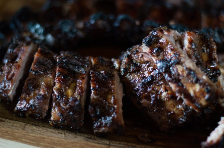 Grilled pork ribs on wooden boardの写真素材