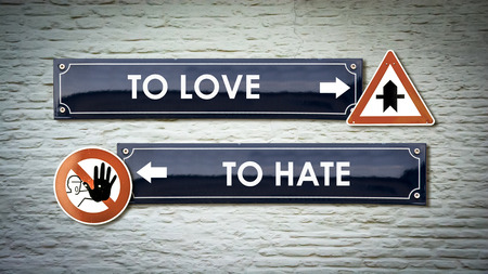 Street Sign TO LOVE versus TO HATEの写真素材