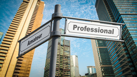 Street Sign Professional versus Amateurの写真素材
