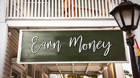 Street Sign Earn Moneyの写真素材