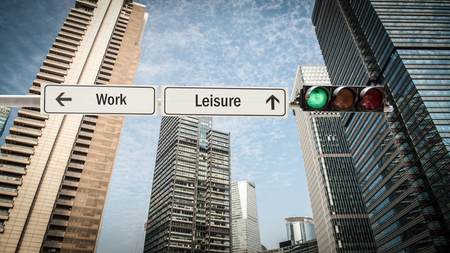 Street Sign Leisure versus Workの写真素材