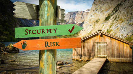 Street Sign Security versus Riskの写真素材