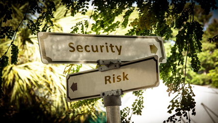 Street Sign Security versus Riskの写真素材