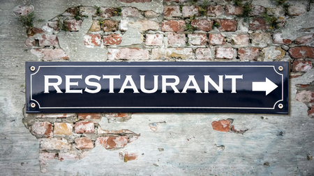 Street Sign to Restaurantの写真素材