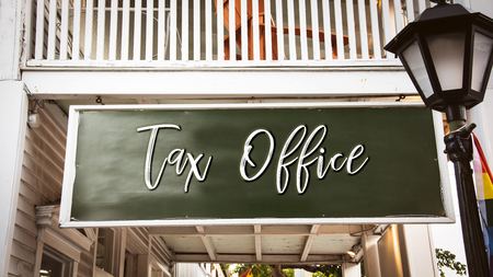 Street Sign to Tax Officeの写真素材