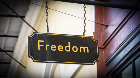 Street Sign the Direction Way to Freedomの写真素材