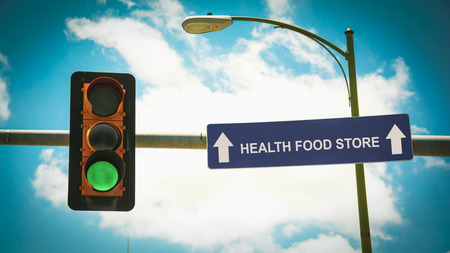 Street Sign the Direction Way to HEALTH FOOD STOREの写真素材
