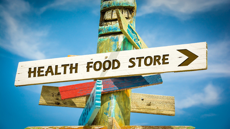 Street Sign the Direction Way to HEALTH FOOD STOREの写真素材
