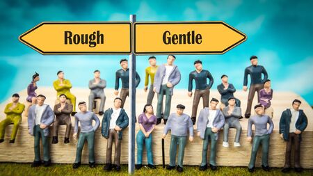 Street Sign the Direction Way to Gentle versus Roughの写真素材