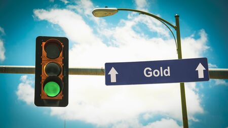 Street Sign the Direction Way to Goldの写真素材