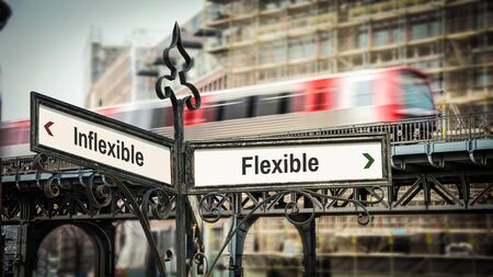Street Sign the Direction Way to Flexible versus Inflexibleの写真素材