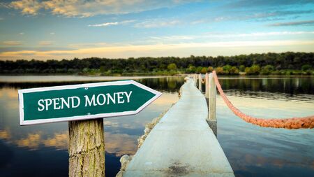 Street Sign the Direction Way to Spend Moneyの写真素材