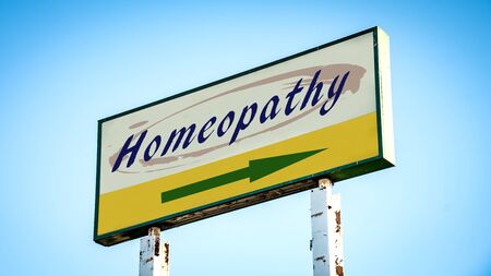 Street Sign the Direction Way to Homeopathyの写真素材