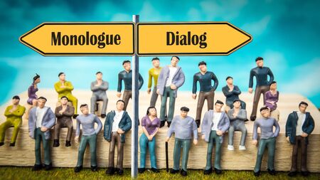 Street Sign the Direction Way to Dialog versus Monologueの写真素材