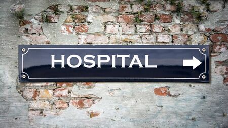 Street Sign the Direction Way to Hospitalの写真素材