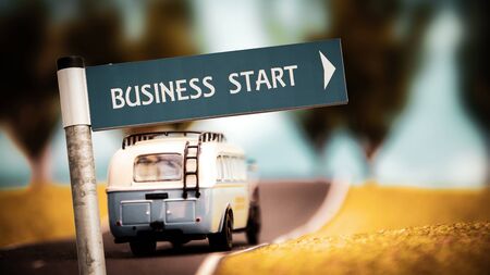 Street Sign the Direction Way to BUSINESS STARTの写真素材