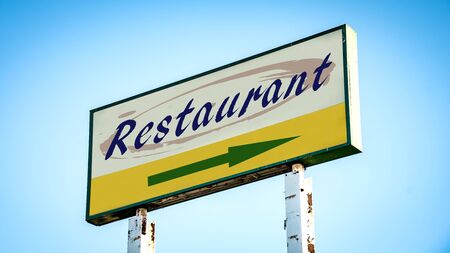 Street Sign the Direction Way to Restaurantの写真素材