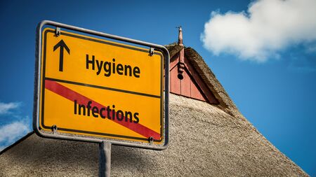 Street Sign the Direction Way to Hygiene versus Infectionsの写真素材