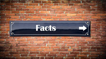Street Sign the Direction Way to Factsの写真素材