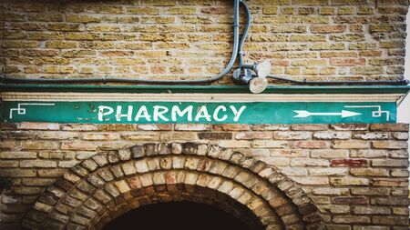 Street Sign the Direction Way to Pharmacyの写真素材
