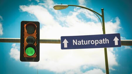 Street Sign the Direction Way to Naturopathの写真素材